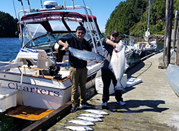 Paul with a giant halibut fish, Fishing Charter Ucluelet, BC